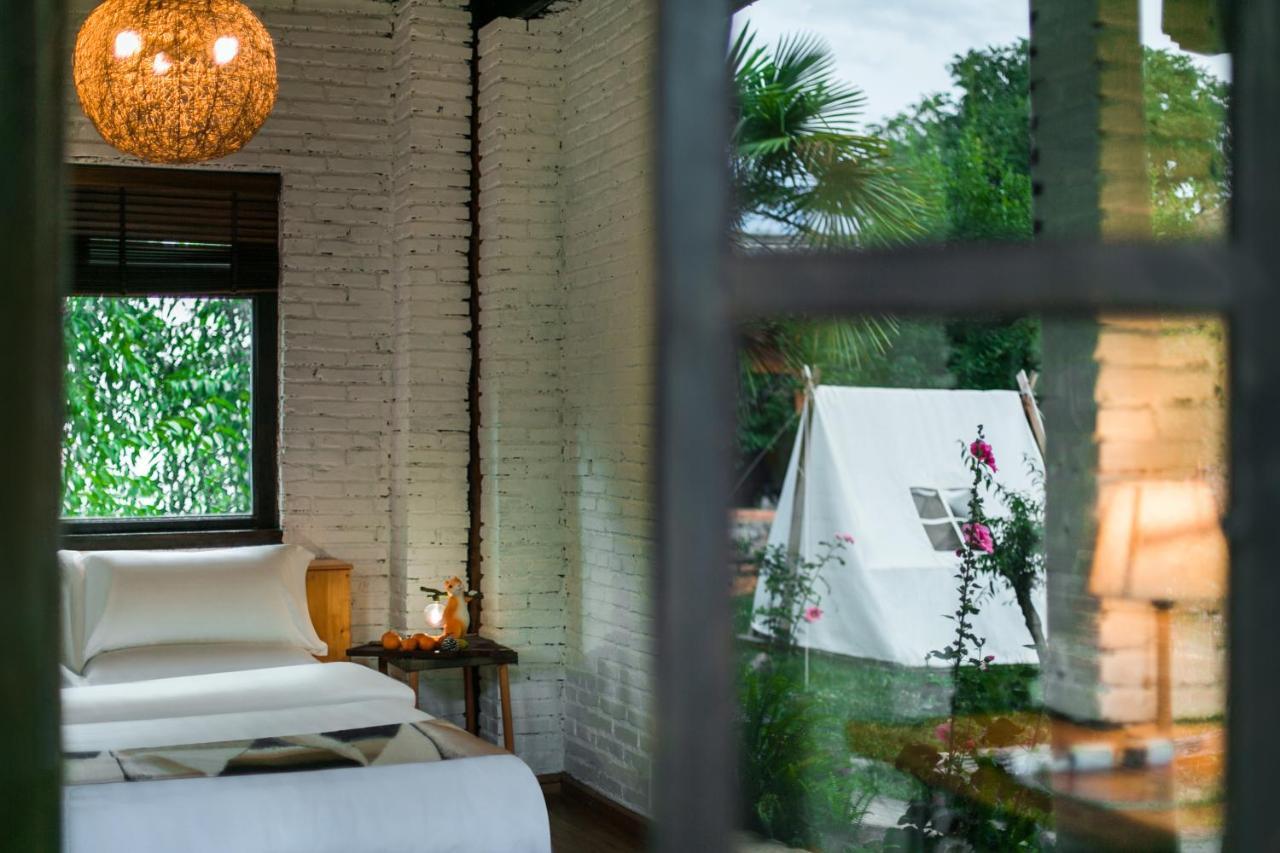 Adonis Inn Lijiang Лицзян Экстерьер фото